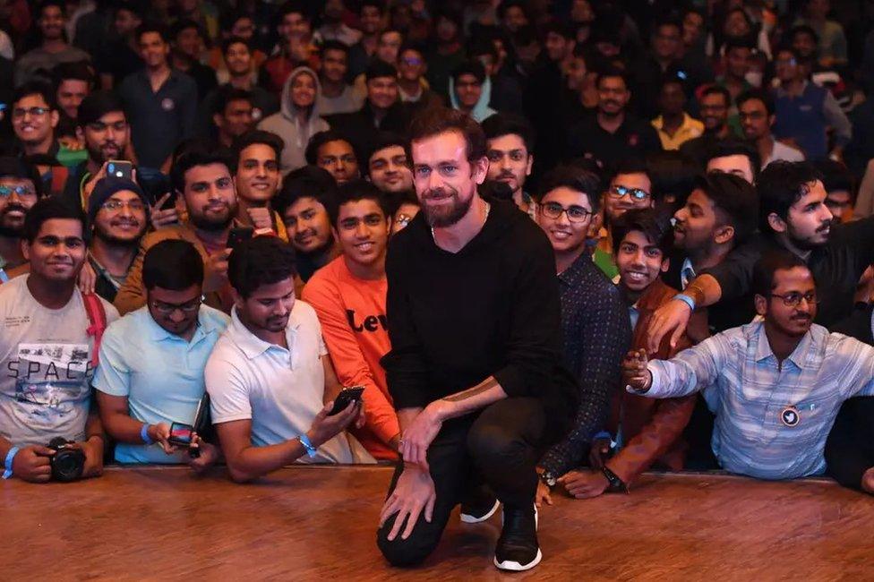 Twitter CEO and co-founder Jack Dorsey (C) poses with students after an interaction session at the Indian Institute of Technology (IIT) in New Delhi on 12 November 2018