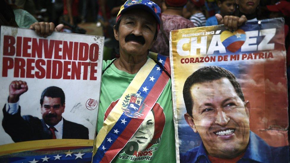 Supporters of Venezuela's President Nicolás Maduro take part in a march in Caracas, 13 April 2019