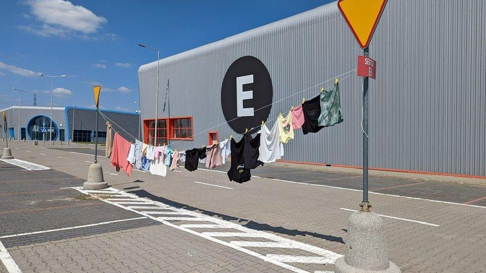 A makeshift washing line outside the centre in Warsaw