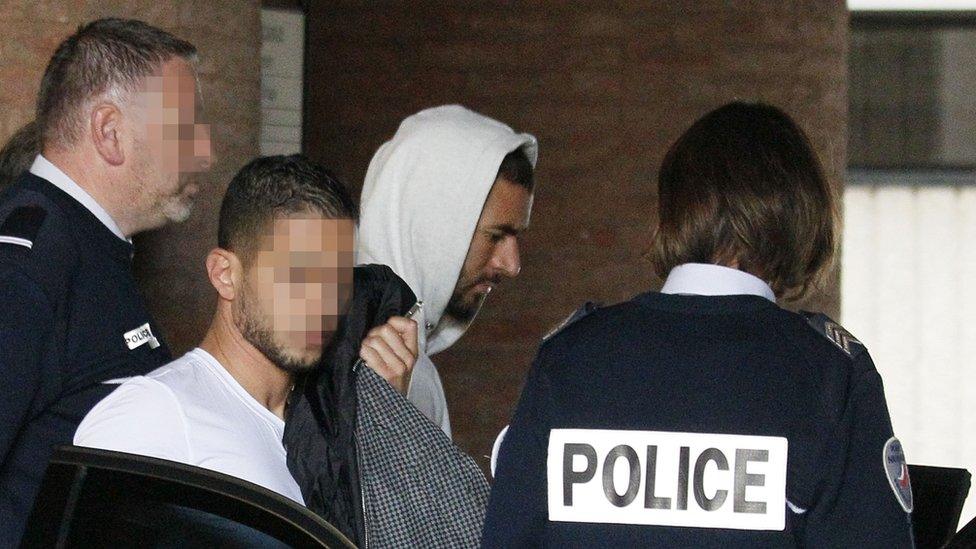 French striker Karim Benzema leaves the court house in Versailles, near Paris, on November 5, 2015