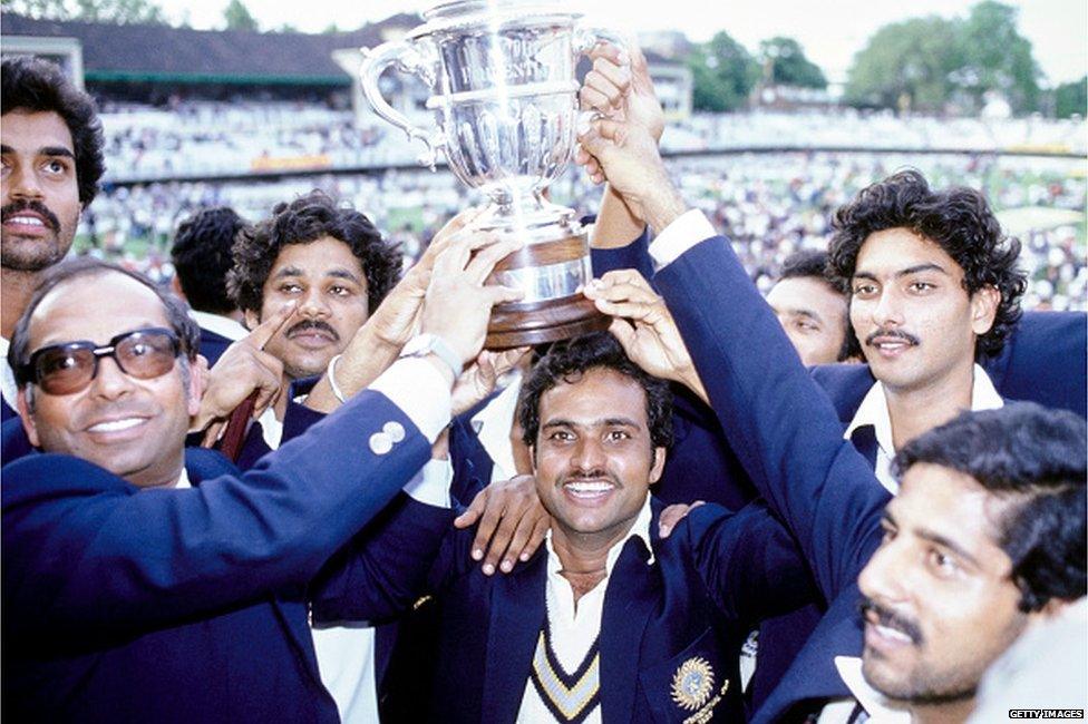 India batsman Yashpal Sharma (c) holds the trophy with squad player Ravi Shastri (2nd r) and team mates on the balcony after the 1983 Cricket World Cup final Match between India and West Indies at Lords on June 25th, 1983 in London, England.