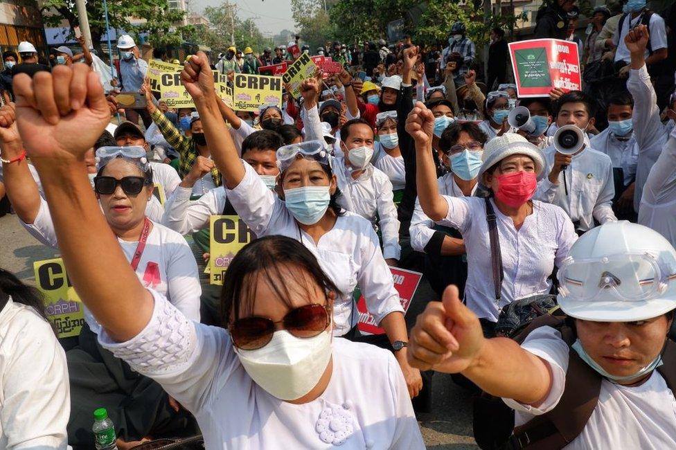 People continue to protest against military coup and detention of elected government members in Mandalay, Myanmar on March 13, 2021.