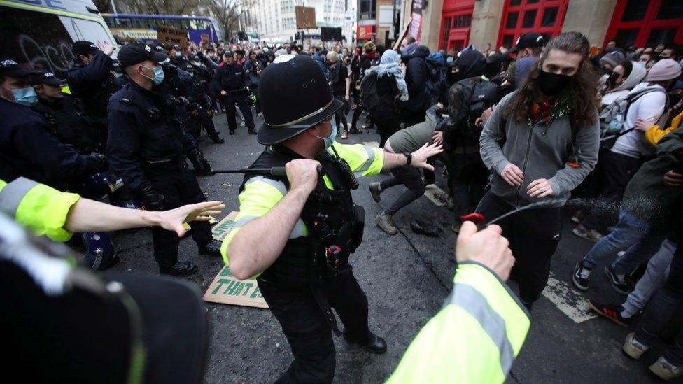 Police with batons