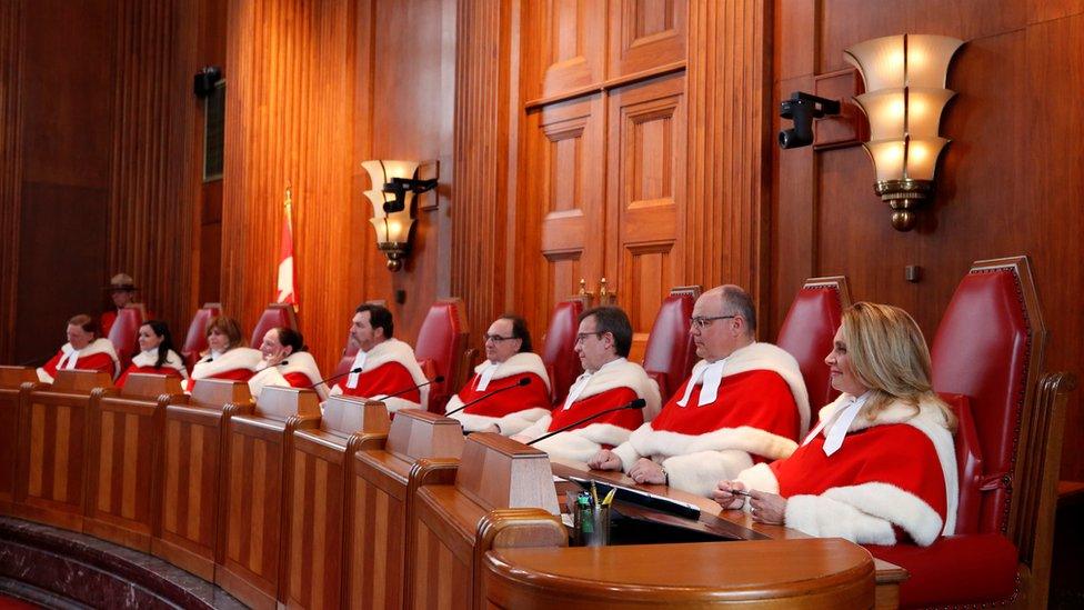 Canada's Supreme Court Justices take part in an official welcome ceremony at the Supreme Court of Canada