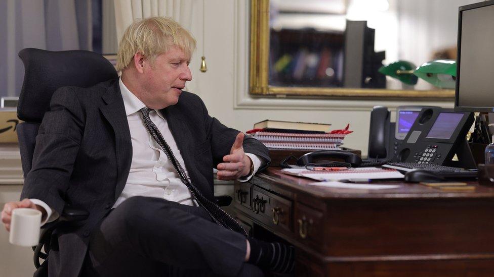 Boris Johnson speaks on the phone