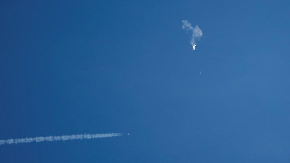 The deflating balloon after it was shot down by a missile from a US Air Force F-22 Raptor