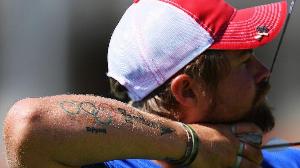 A tattoo seen on the arm of Brady Ellison of the US during a training session at the Sambodromo Olympic Archery venue on August 2, 2016 in Rio de Janeiro, Brazil