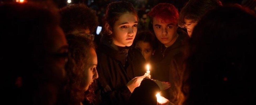 People at a vigil in Pittsburgh's Squirrel Hill