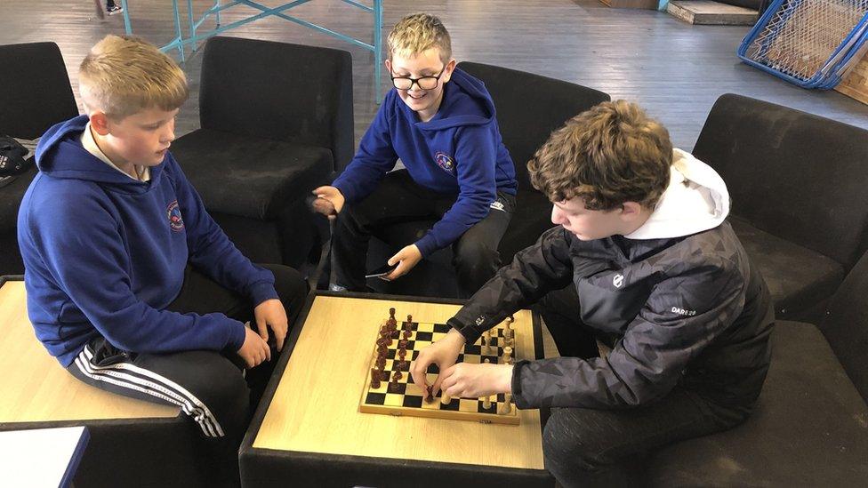 boys playing chess