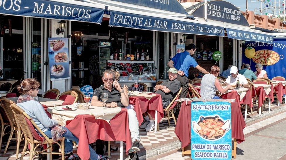 Expats and tourists at restaurant in Benalmadena, Spain, 17 Mar 16