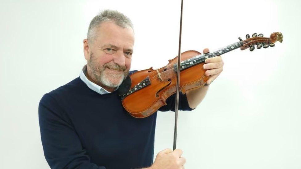 Dermot Crehan, current owner of the violin