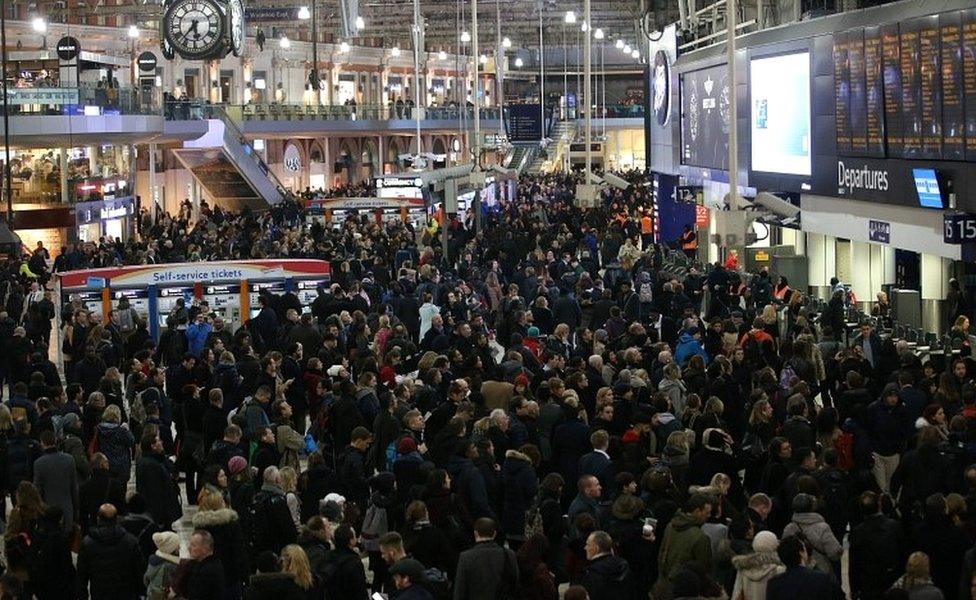 Commuters waiting at Waterloo station