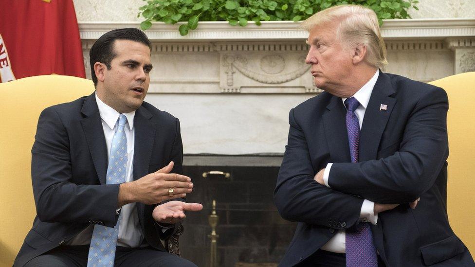 Ricardo Rossello and Donald Trump sitting and talking