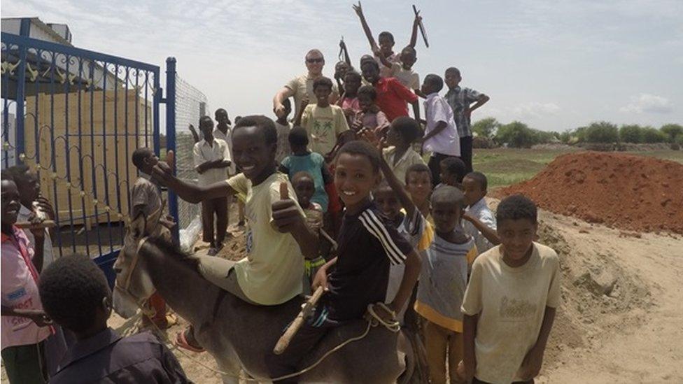 African children at new water treatment plant