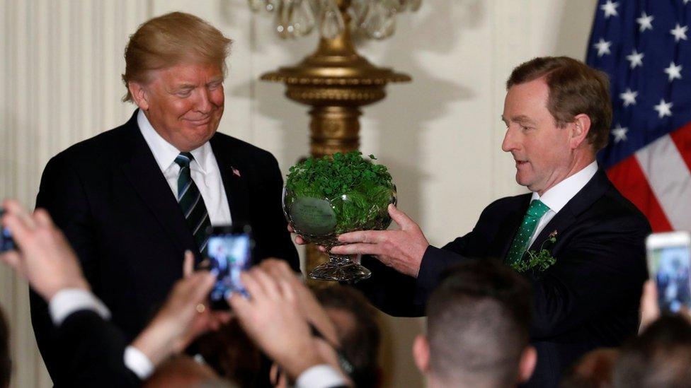 Enda Kenny presents Donald Trump with a bowl of shamrock