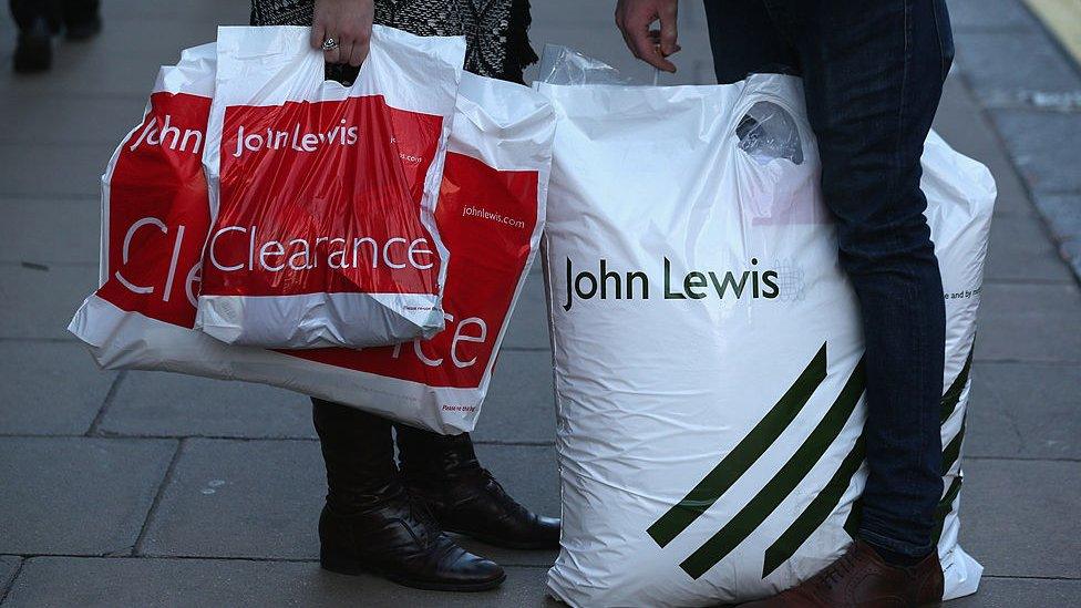 Shoppers with John Lewis bags