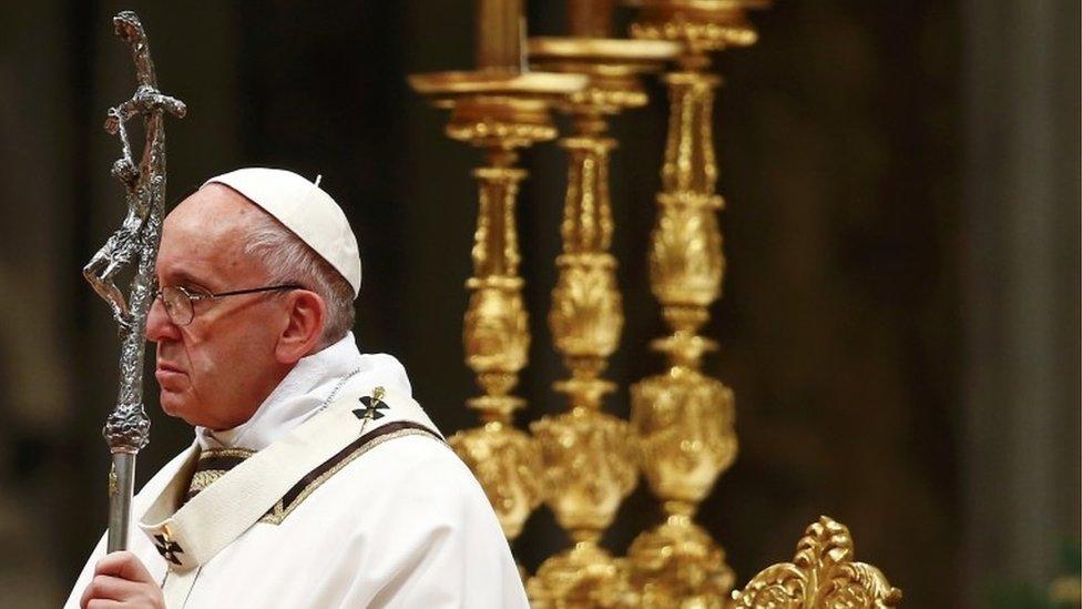 Pope Francis leads the Christmas Eve Mass in Saint Peter's Basilica at the Vatican December 24, 2016.