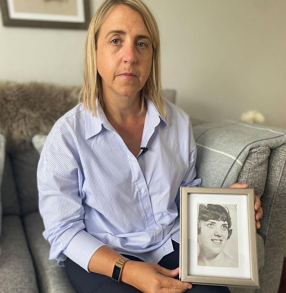 Helen Orr holding picture of Anne Currie