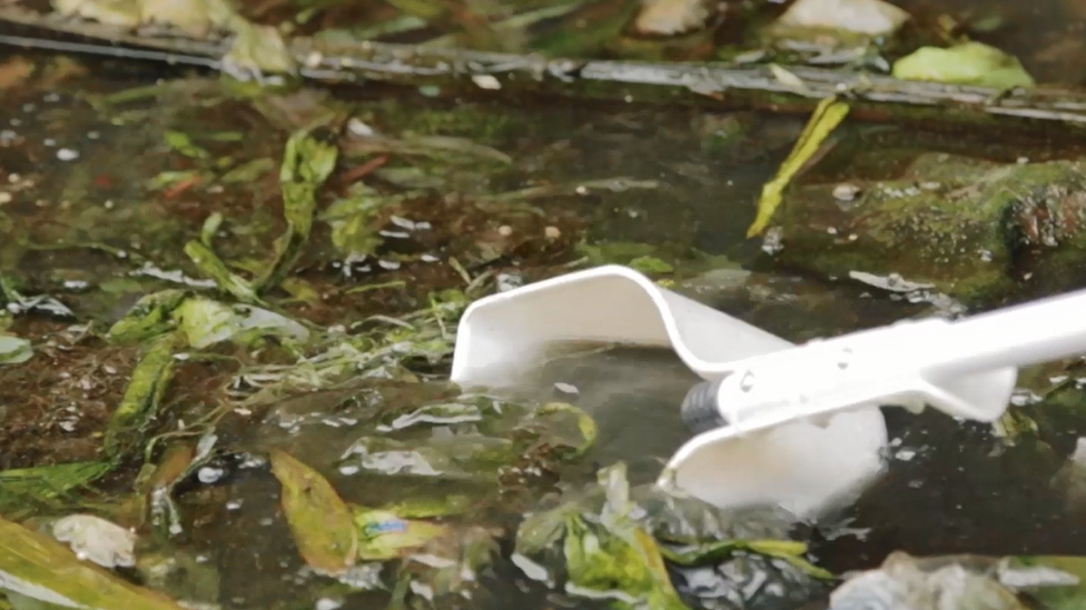 Screengrab of trash in the Tullahan River