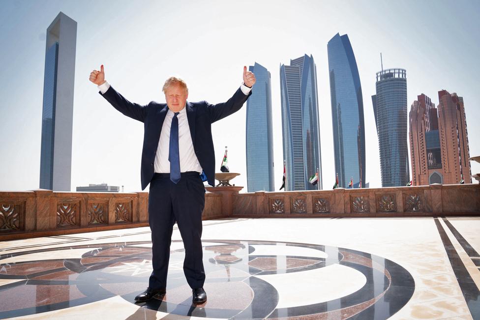 British Prime Minister Boris Johnson arrives for a media interview at the Emirates Palace hotel in Abu Dhabi during his visit to the United Arab Emirates (UAE) on 16 March 2022.