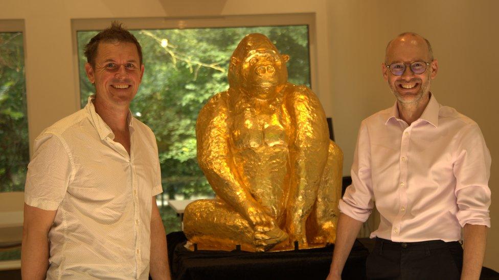 Artist Luke Jerram and CEO Justin Morris with the sculpture