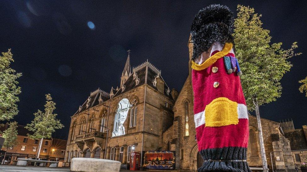 An image of King Charles III beamed on to Bishop Auckland Town Hall