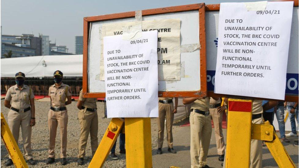 Unavailability of vaccine stock posters outside Bandra Kurla complex jumbo vaccination centre in Mumbai