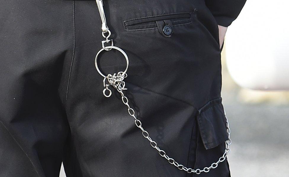 The belt and chain of a member of the Prison Service