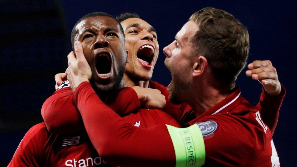 Liverpool's Georginio Wijnaldum with Jordan Henderson and Trent Alexander-Arnold