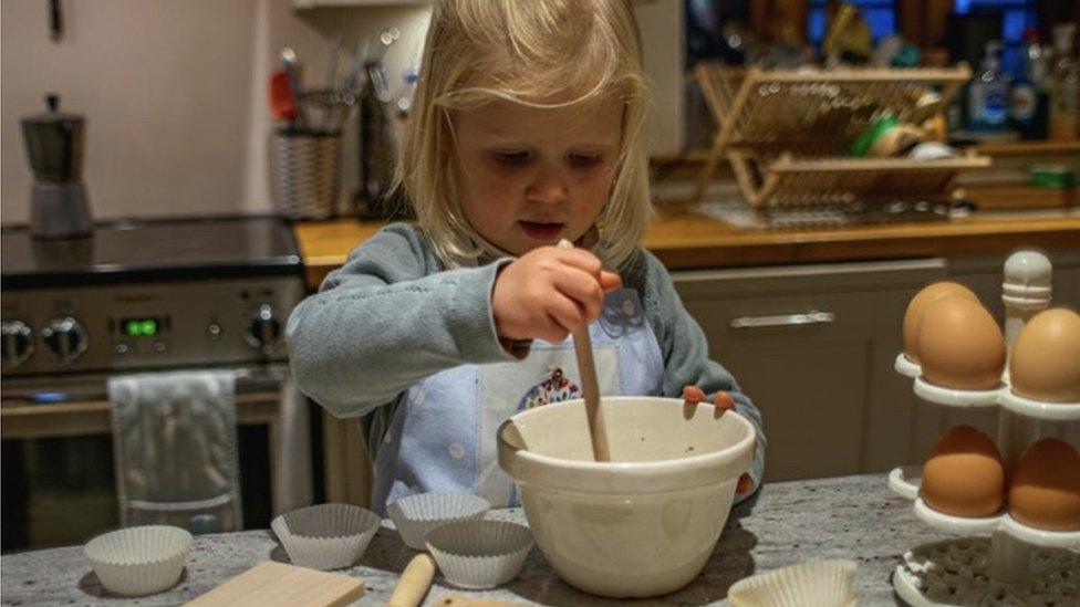 Katherine's daughter Beatrix baking