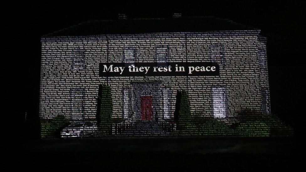 The names of children who died in Bessborough Mother and Baby Home in Cork projected onto Sean Ross Abbey