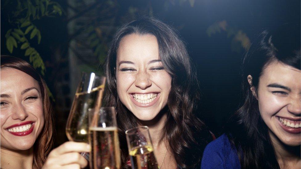 Women drinking sparkling wine