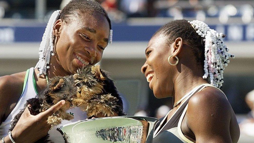 Venus_and_Serena_Williams_celebrate_winning_US_Open_Doubles