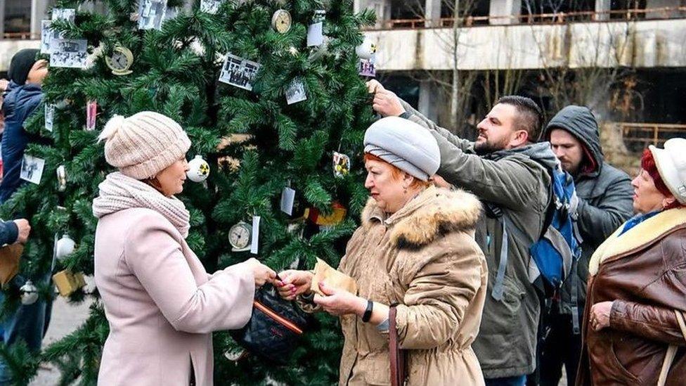 Clock decorations on tree