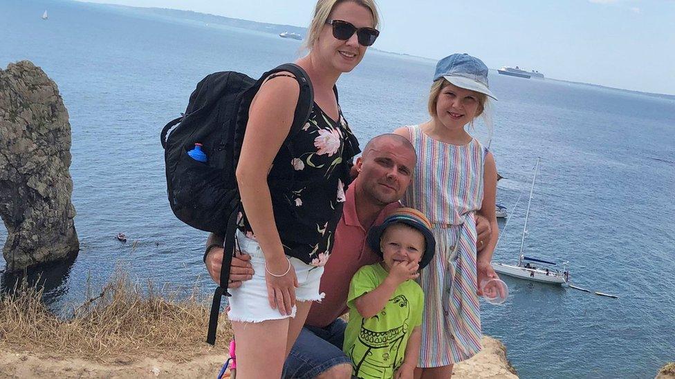 Tom Cotterill, his wife, Laura, two-year-old son Jude and nine-year-old daughter Anya