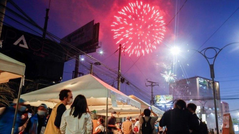 Celebratory fireworks illuminate the sky after polls closed in the municipal and parliamentary elections in San Salvador, El Salvador, February 28, 2021.