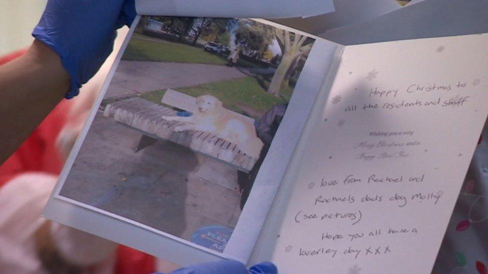 Person holding a Christmas card