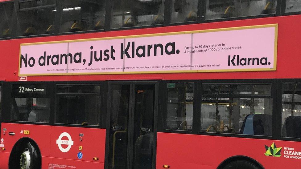 Klarna advert on the side of a bus