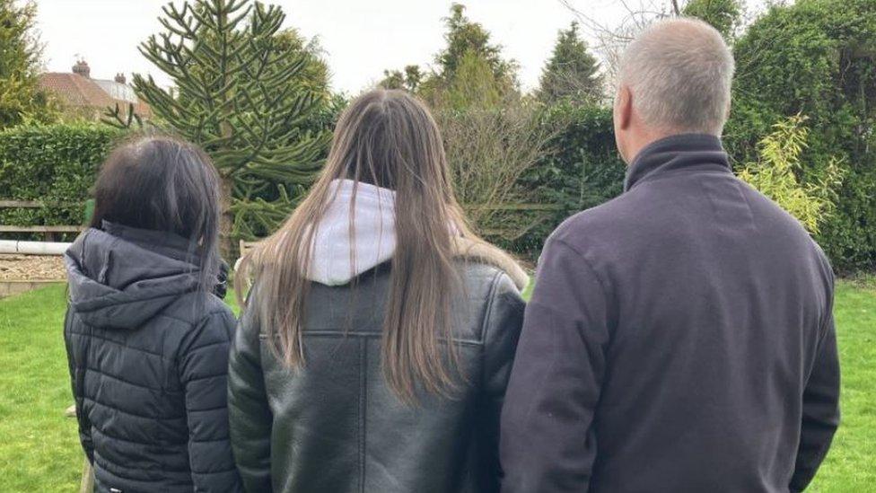 Kirsty (middle) and parents