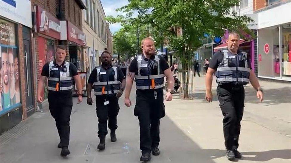 Four safer streets warden walk in Swindon town centre