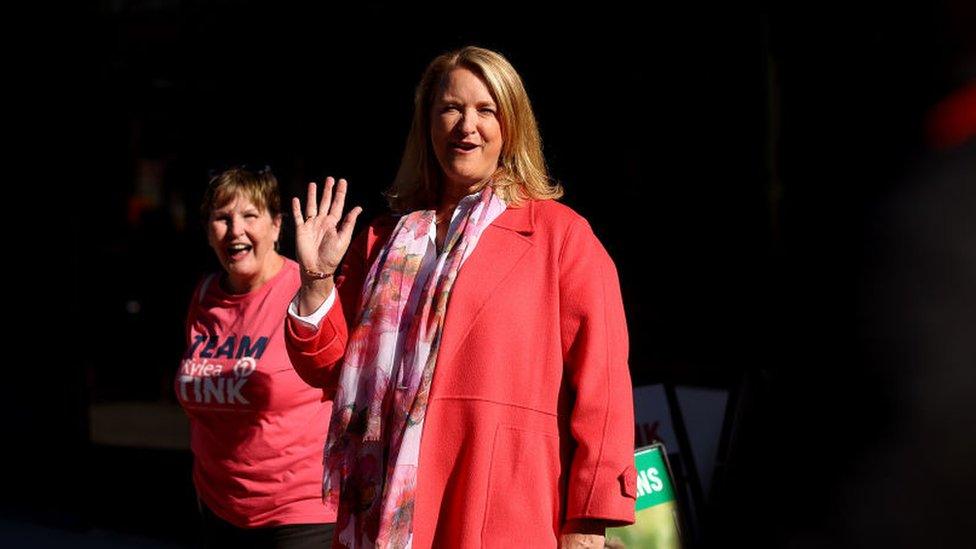 Independent candidate Kylea Tink is pictured waving