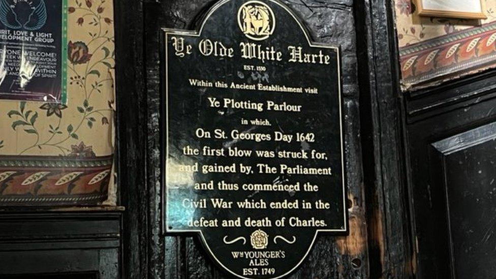 A plaque commemorating the pub's rich history