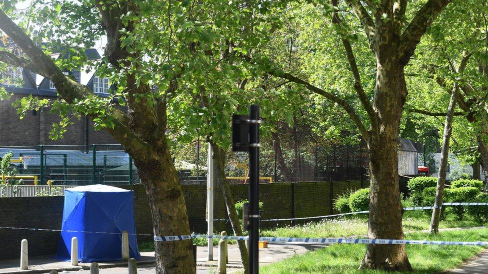 A forensic blue by the police cordon in Warham Street