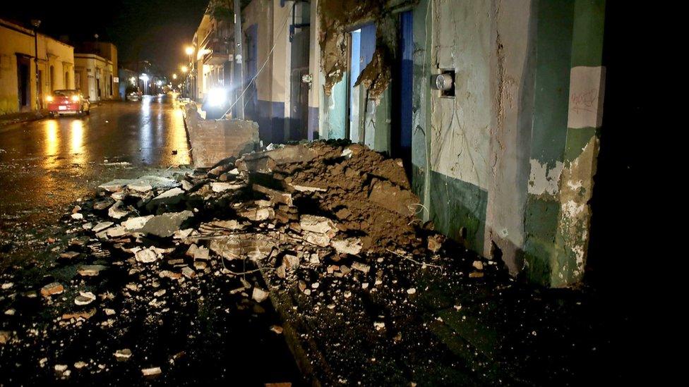 Pile of bricks and rubble on street