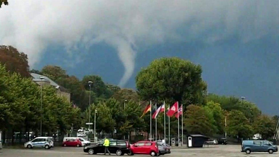 A waterspout-like tornado in the port city of Kiel, Germany