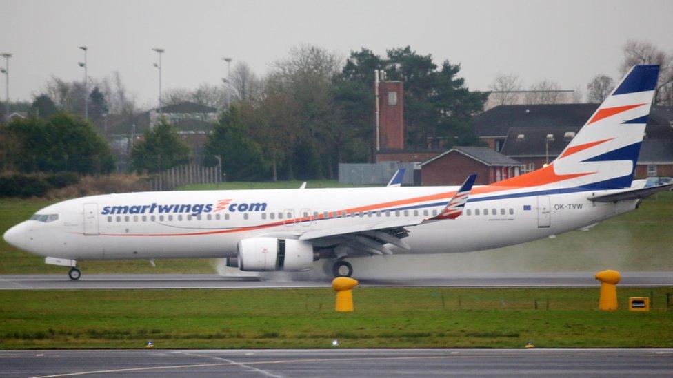 Plane that brought refugees to Belfast