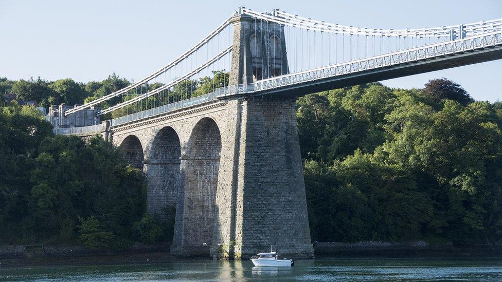 All creatures great and small... Rupert Jones captures this boat fishing under the grand Menai suspension bridge