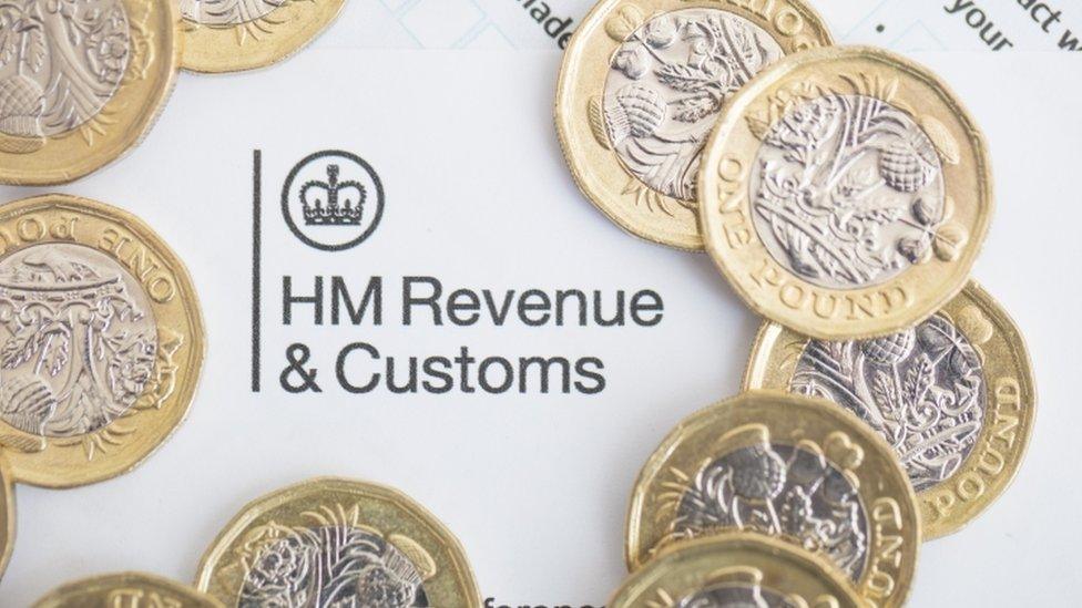 HMRC logo and pound coins