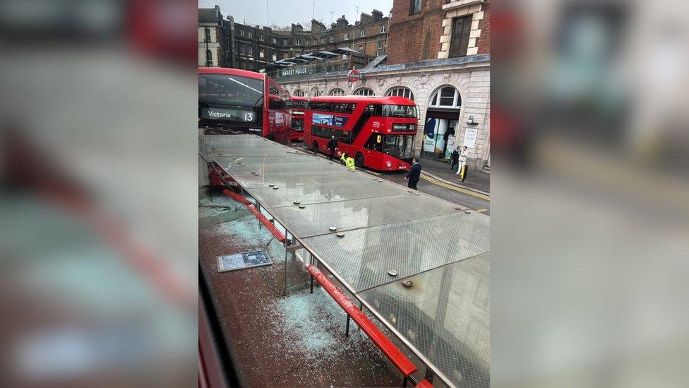 Broken glass on the floor following the crash