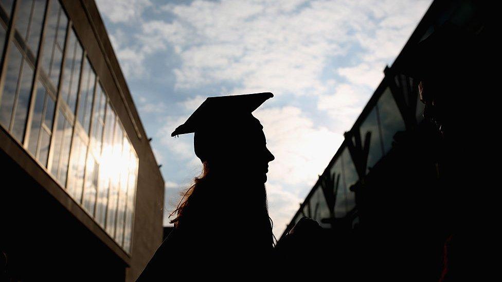 A student graduating